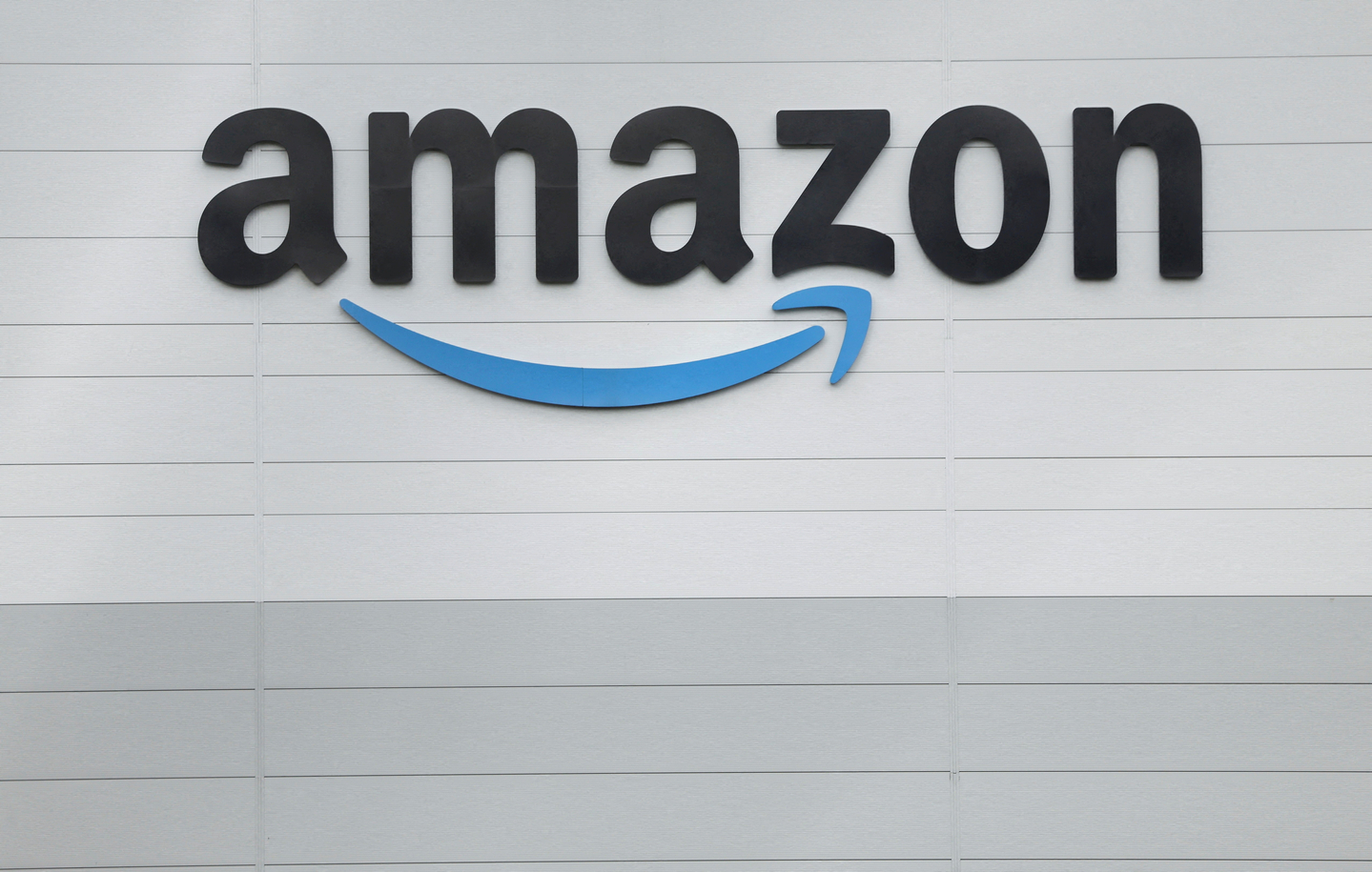 The logo of Amazon is seen outside its logistics center in Baldonnell Business Park in Dublin on Oct. 28, 2025. [REUTERS/YONHAP] 