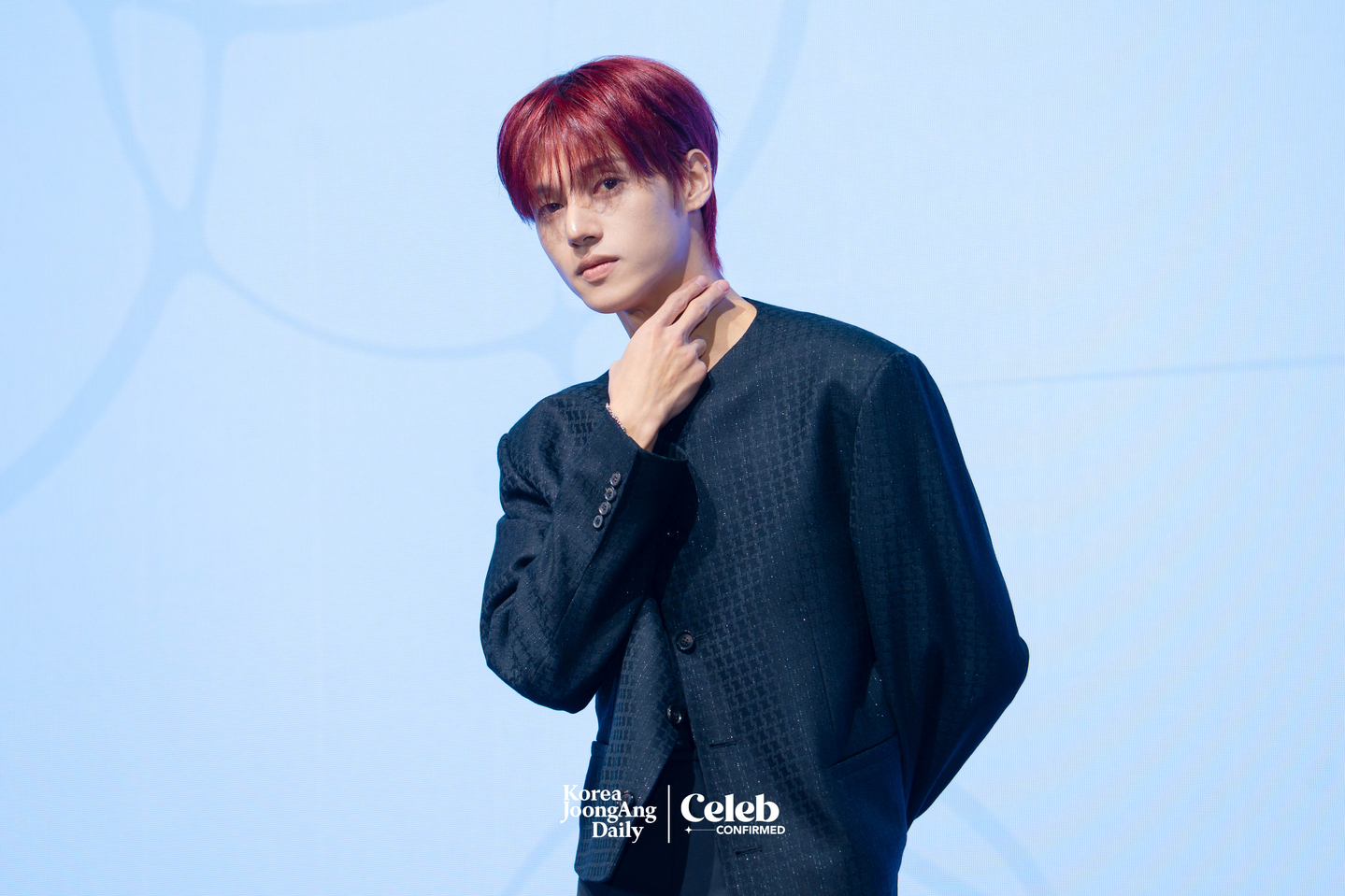 Ateez’s Wooyoung poses for photos during a press conference for the release of the group’s 13th EP, “Golden Hour: Part.4,” at the Fairmont Ambassador Seoul in western Seoul on Feb. 5. [DANIELA GONZALEZ PEREZ]