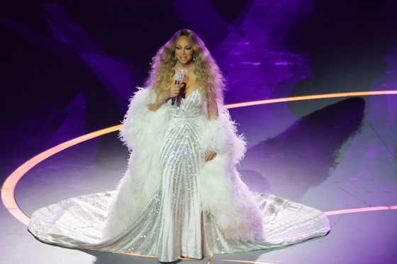 Mariah Carey performs at the opening ceremony of the 2026 Milan-Cortina Winter Olympics held at the San Siro stadium in Milan on Feb. 6. [KIM JONG-HO]