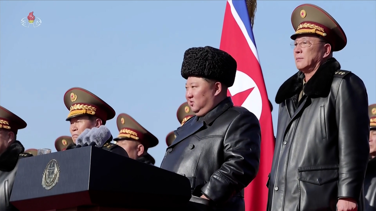 North Korean leader Kim Jong-un, center, speaks during a visit to the Ministry of National Defense on the occasion of the 78th anniversary of the founding of the Korean People’s Army, also known as Army Day, on Feb. 8. [RODONG SINMUN] 