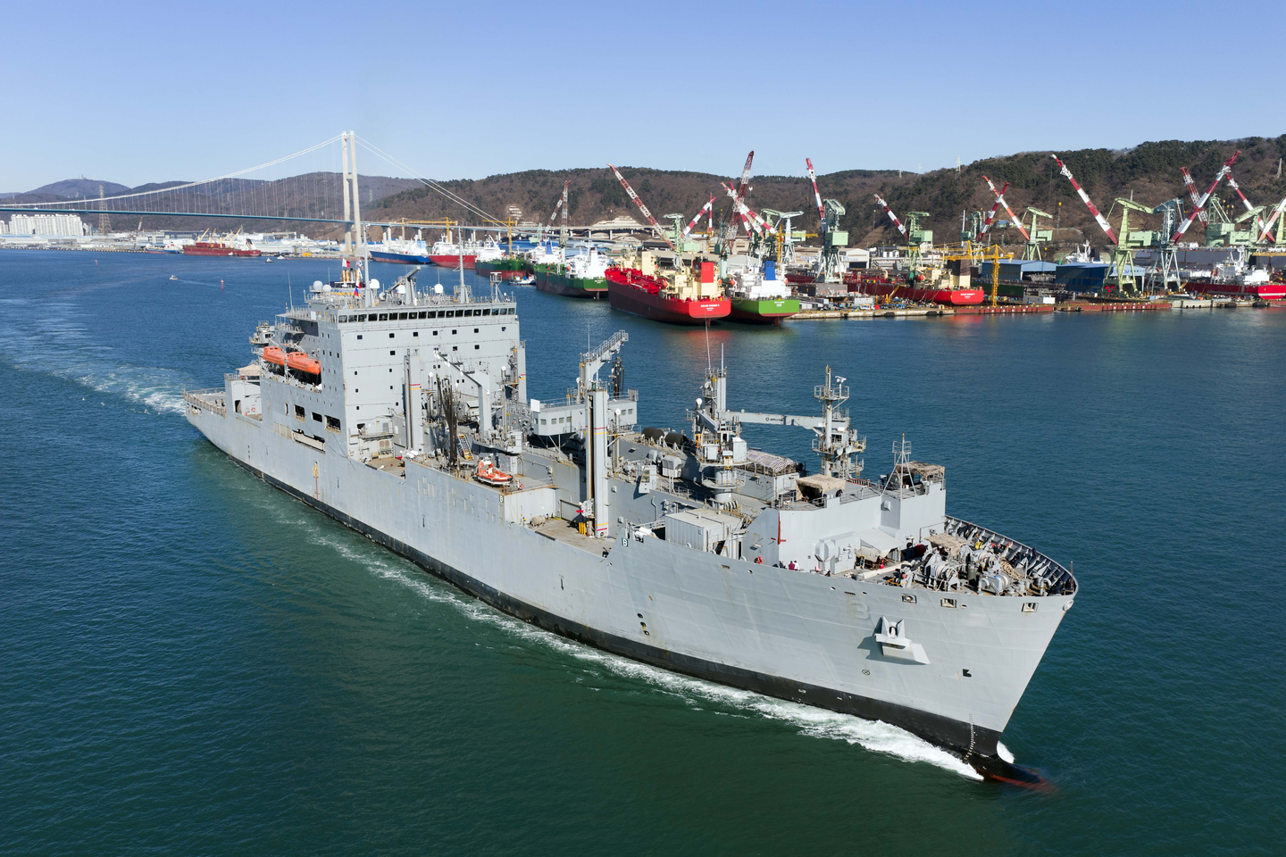The USNS Alan Shepard, a U.S. Navy vessel, departs after completing scheduled maintenance at a pier near HD Hyundai Heavy Industries’ medium-sized ship division in Ulsan. [HD HYUNDAI HEAVY INDUSTRIES]