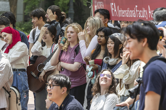 Students watch performances during Korea University's International Students & Faculty Festival on May 13, 2025. [YONHAP] 