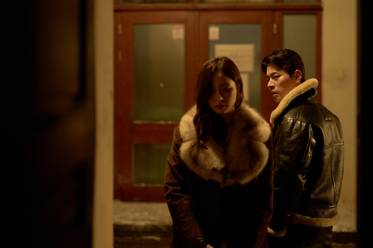 Actors Shin Sae-kyeong, left, and Park Jeong-min in a still from director Ryoo Seung-wan's action film ″Humint″ [NEW]