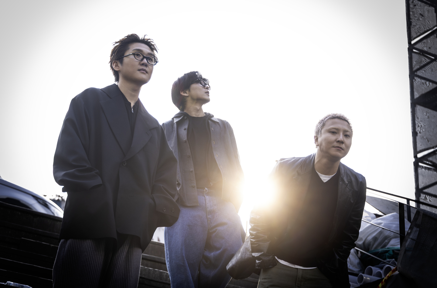 Band wave to earth is pictured with Cha Soon-jong, left, Kim Daniel, center, and Shin Dong-gyu. [KWEN HYEK-JAE]