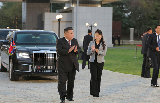 North Korean leader Kim Jong-un, left, and his daughter are seen at the Central Cadres Training School of the Workers' Party of Korea in Pyongyang on Oct. 11, 2024, in this photo released by the North's state-run Rodong Sinmun. [NEWS1] 