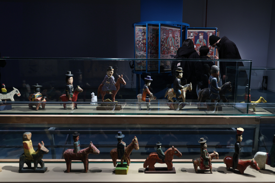  “The Famous Feast of the Horse” is on display at the National Folk Museum of Korea in Jongno District, central Seoul, on Dec. 16. [YONHAP]