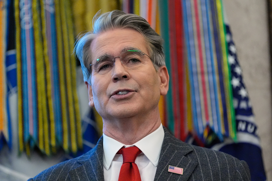 U.S. Treasury Secretary Scott Bessent speaks during an event with U.S. President Donald Trump in the Oval Office at the White House in Washington on Feb. 2. [AP/YONHAP]