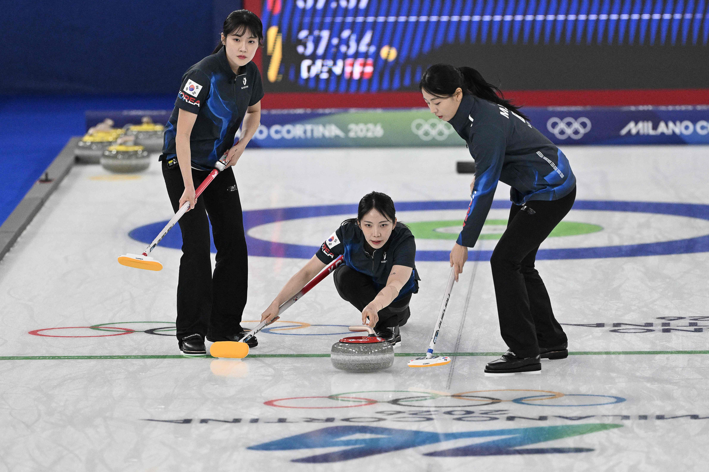 Team Korea deliver the stone during a curling women's round robin between Korea and Denmark during the Milan-Cortina 2026 Winter Olympic Games at the Cortina Curling Olympic Stadium on Feb. 14.  [YONHAP]