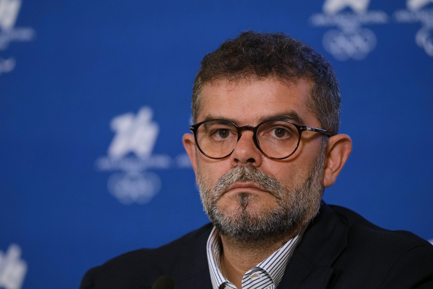 Luca Casassa, spokesperson for the Milan-Cortina 2026 Olympic organizing committee, speaks during a press conference of the committee in Milan on Sept. 17, 2025. [AP/YONHAP] 