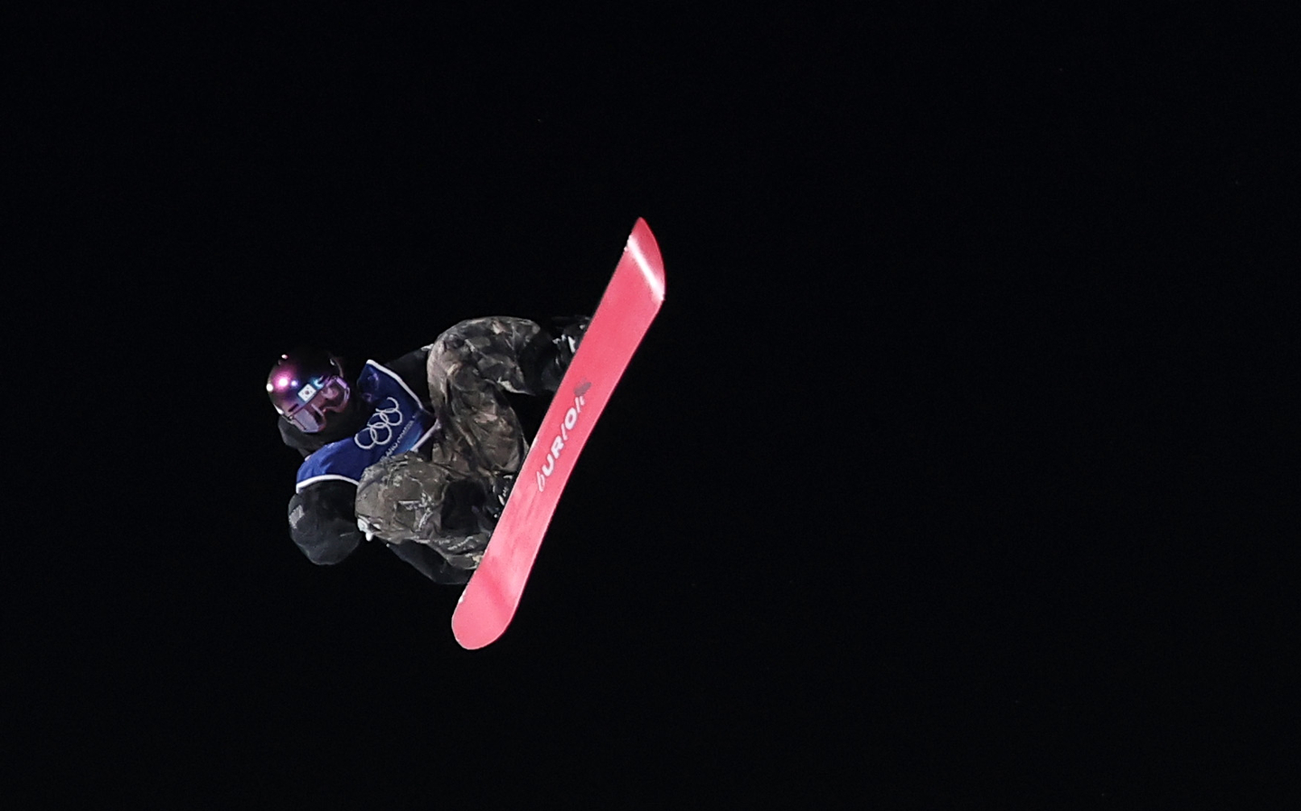 Snowboarder Yu Seung-eun performs a trick during the women’s big air final at the Milan-Cortina Winter Olympics at Livigno Snow Park in Livigno, Italy, on Feb. 9. [NEWS1]
