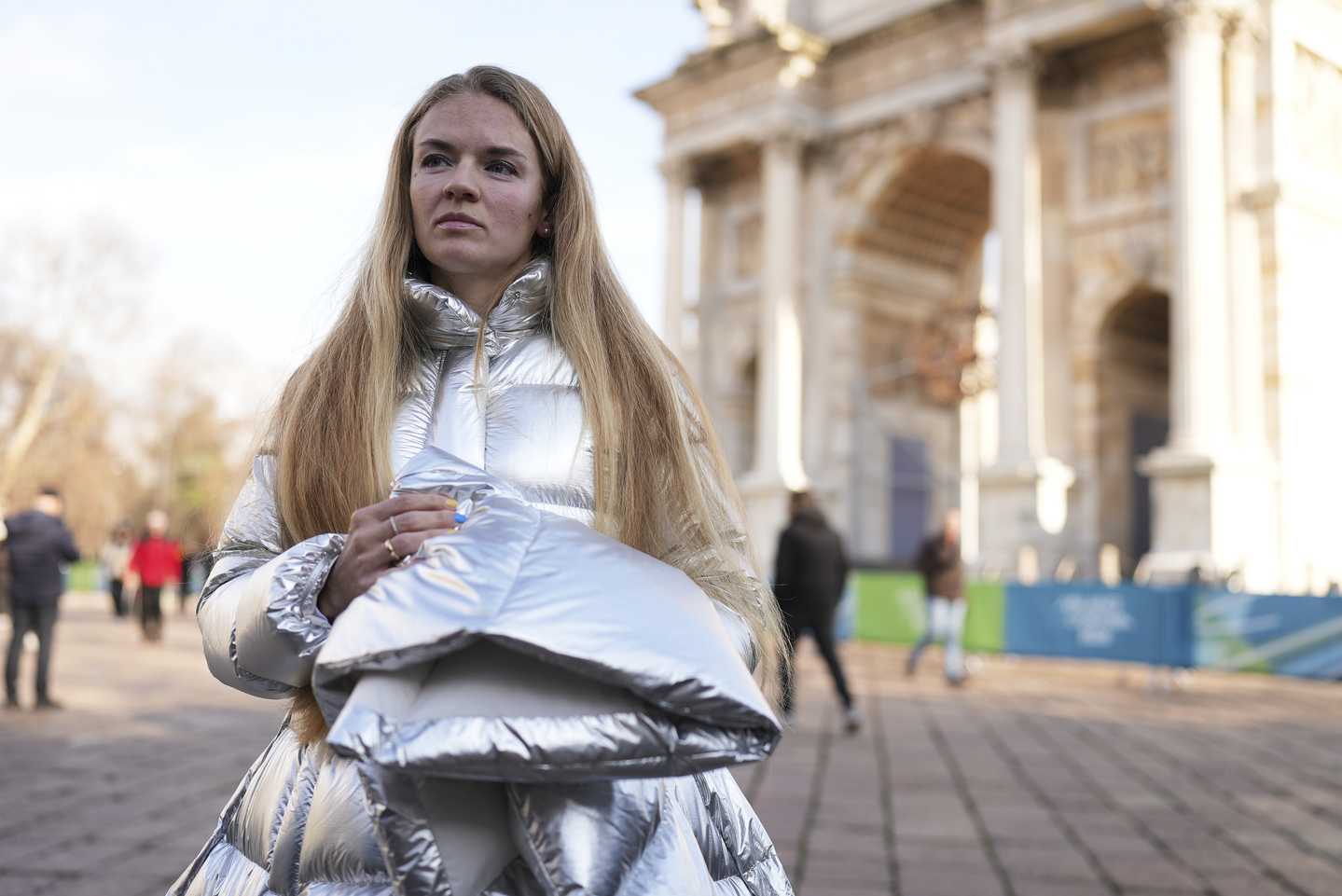 Anastasia Kucherova stands near the Arco della Pace during the 2026 Winter Olympics, in Milan, Italy, on Feb. 16. [AP/YONHAP]