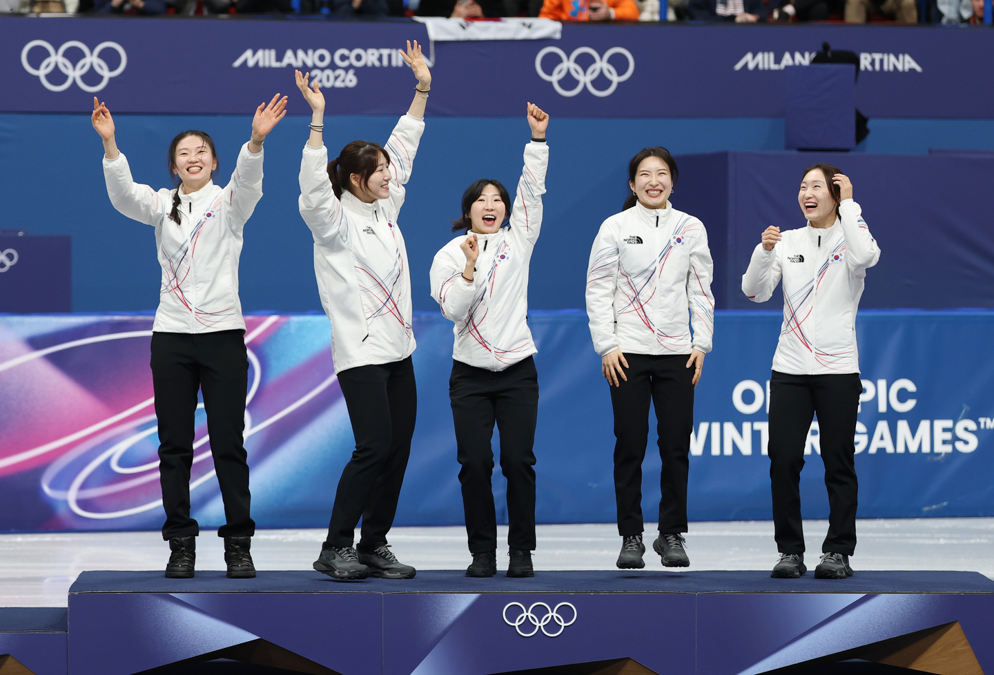 Korean short track skaters are seen during the medal ceremony after the team won the 3,000-meter relay final at the 2026 Milan-Cortina Winter Olympics at the Milan Ice Skating Arena in Milan, Italy on Feb. 18. From left, Shim Suk-hee, Noh Do-hee, Lee So-yeon, Kim Gil-li, Choi Min-jeong. [YONHAP]