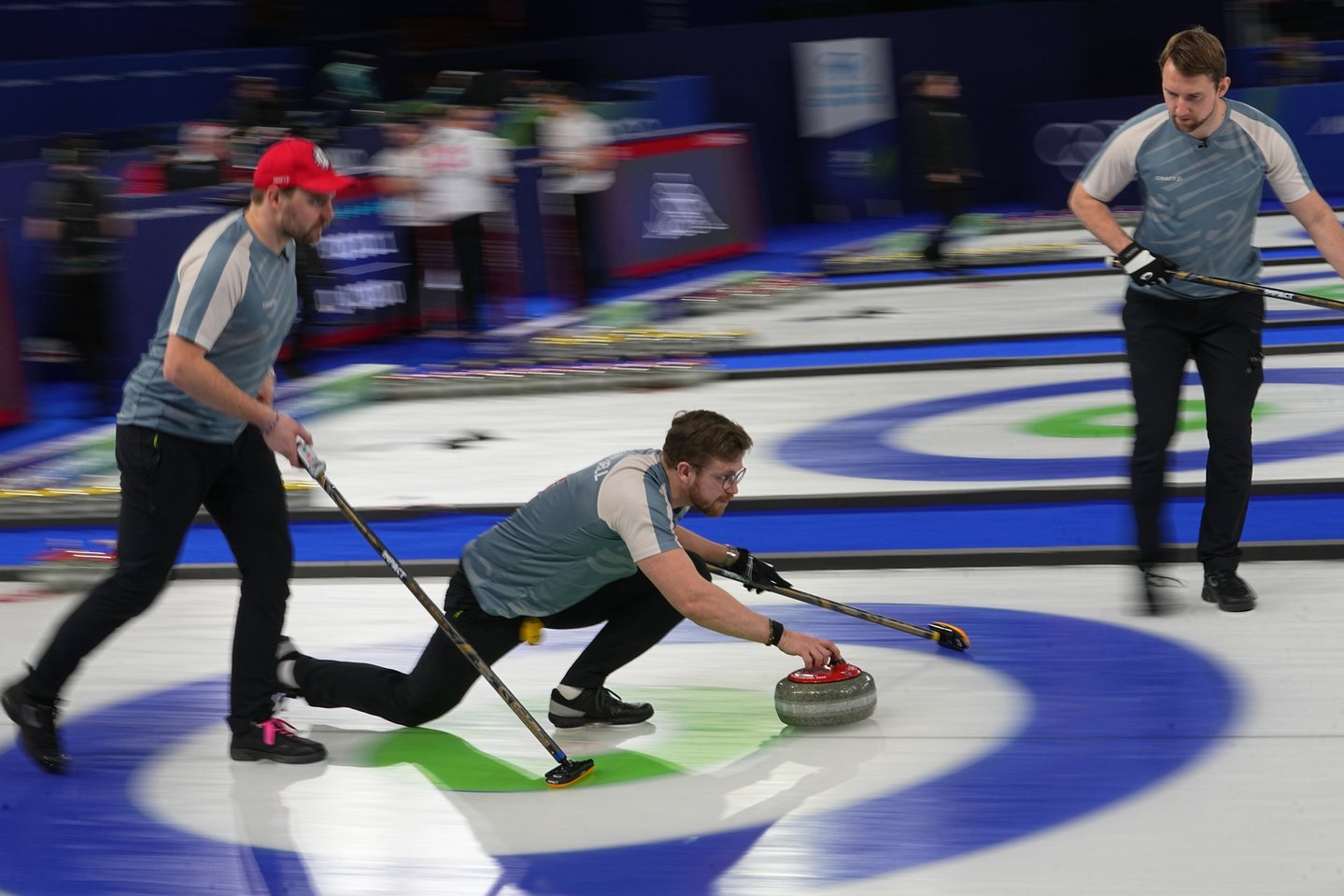 Norway's Martin Sesaker, Bendik Ramsfjell, Gaute Nepstad competes in a men's curling semifinal match against Canada at the 2026 Winter Olympics, in Cortina, Italy, on, Feb. 19. [AP/YONHAP]