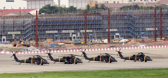 Helicopters sit on the tarmac at Camp Humphreys, a United States Forces Korea base in Pyeongtaek, Gyeonggi on Aug. 12, 2025. [NEWS1] 