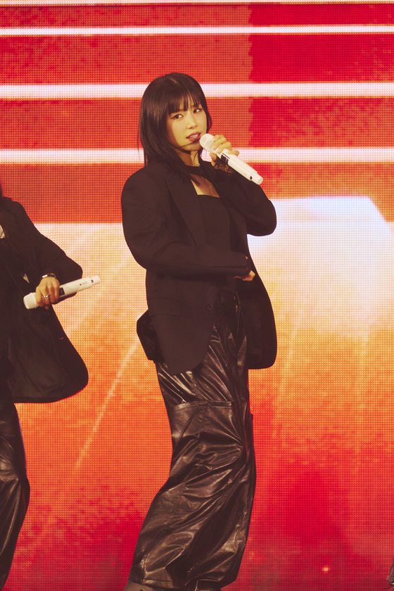 Girl group Apink member Chorong sings during the "The Origin: Apink" concert in Jung District, central Seoul, on Feb. 22. [WITH US ENTERTAINMENT]