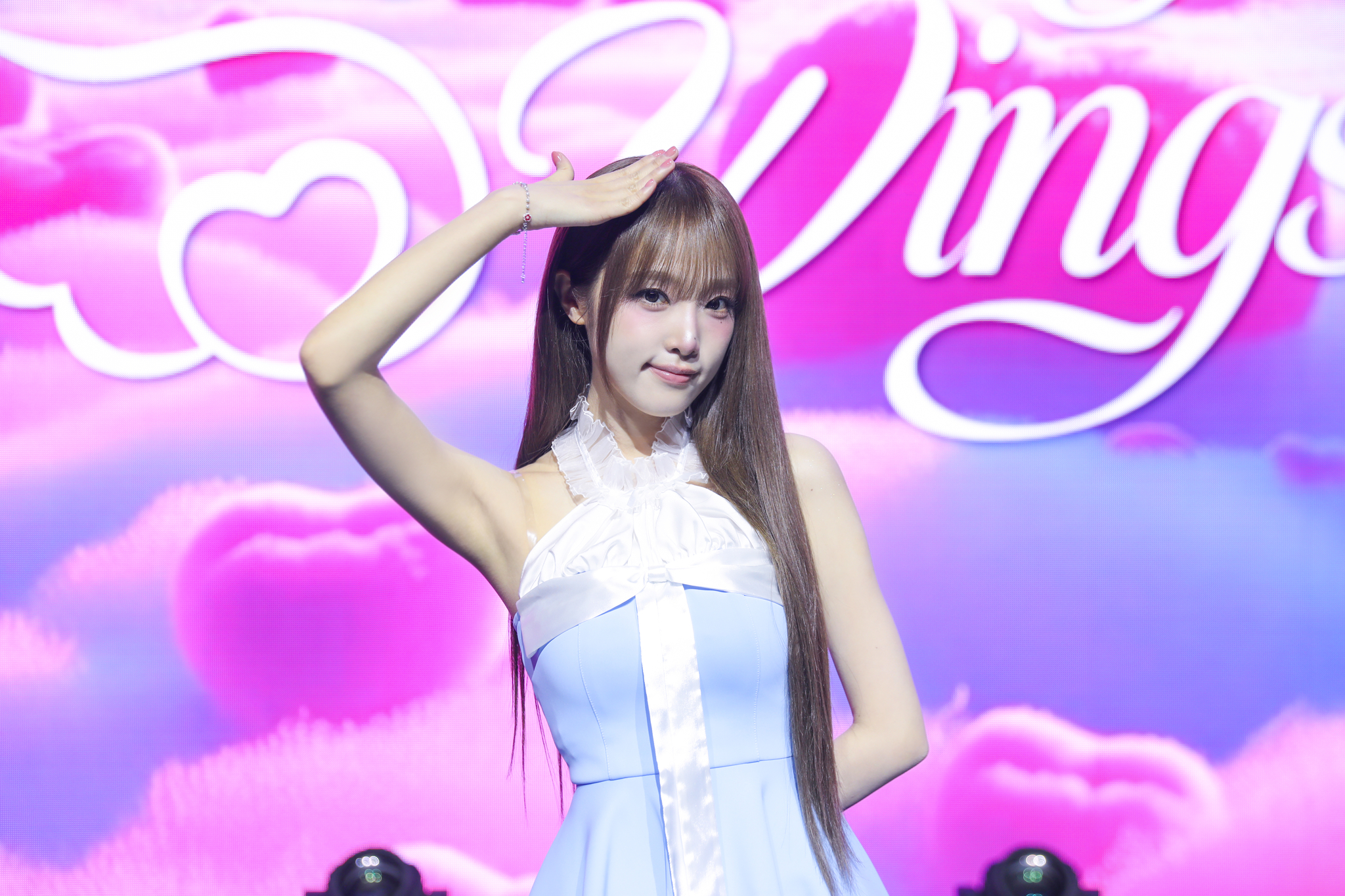 Singer Yena poses for photos during a press showcase for her fourth EP ″Blooming Wings″ at Blue Square SOL Travel Hall in central Seoul on July 29, 2025. [YUE HUA ENTERTAINMENT]
