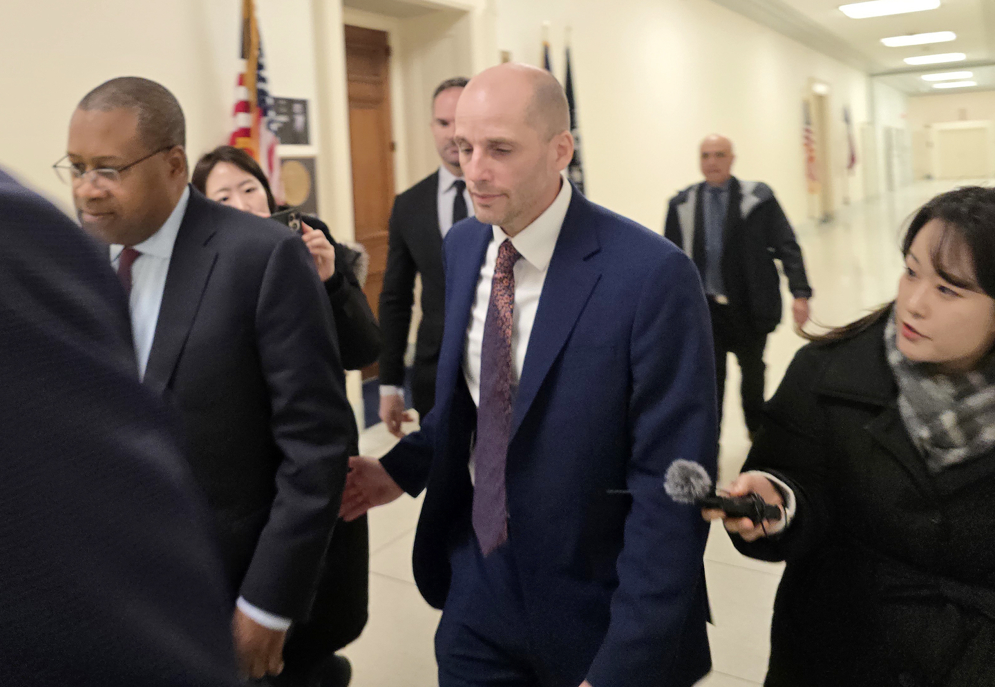 Harold Rogers, center, interim CEO of e-commerce giant Coupang, walks to a U.S. House Judiciary Committee hearing at the Capitol in Washington D.C. on Feb. 23. [NEWS1]