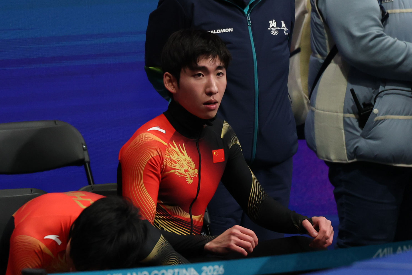China’s Lin Xiaojun leaves the rink after finishing fourth in the men’s 1,500 meters quarterfinals in short track speed skating at the 2026 Winter Olympics at the Milano Ice Skating Arena in Italy, on Feb. 14. [KIM JONG-HO]