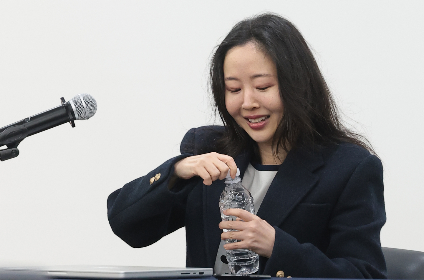 Min Hee-jin, former ADOR CEO and founder of ooak records, attends a press conference held in Jongno District, central Seoul, on Feb. 25. [NEWS1]