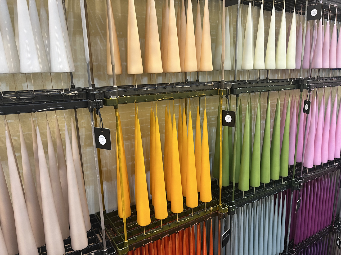 Colourful Ester & Erik candles are displayed on a wall at the Danish pavilion exhibition, at the 2026 Seoul Living Design Fair on Feb. 25. [ALICIA CARR]
