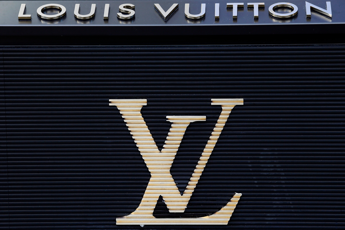 The logo of Louis Vuitton is pictured on the brand's store on the Champs-Élysées Avenue in Paris on Sept. 20, 2017. [AP/YONHAP]