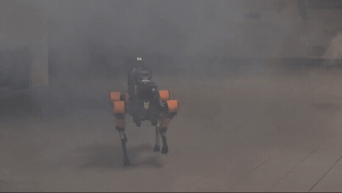 A four-legged robot walks through smoke during a demonstration at the Seoul Metropolitan Fire Academy in Eunpyeong District, northern Seoul, on Feb. 26. [CHO JUNG-WOO]