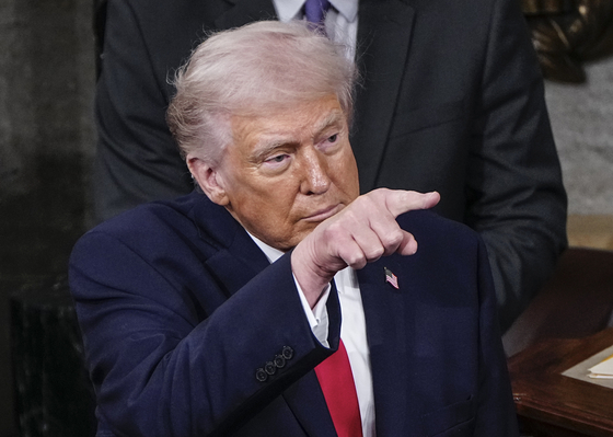 U.S. President Donald Trump points after delivering his State of the Union address during a joint session of Congress in the House Chamber at the U.S. Capitol in Washington on Feb. 24. [UPI/YONHAP] 