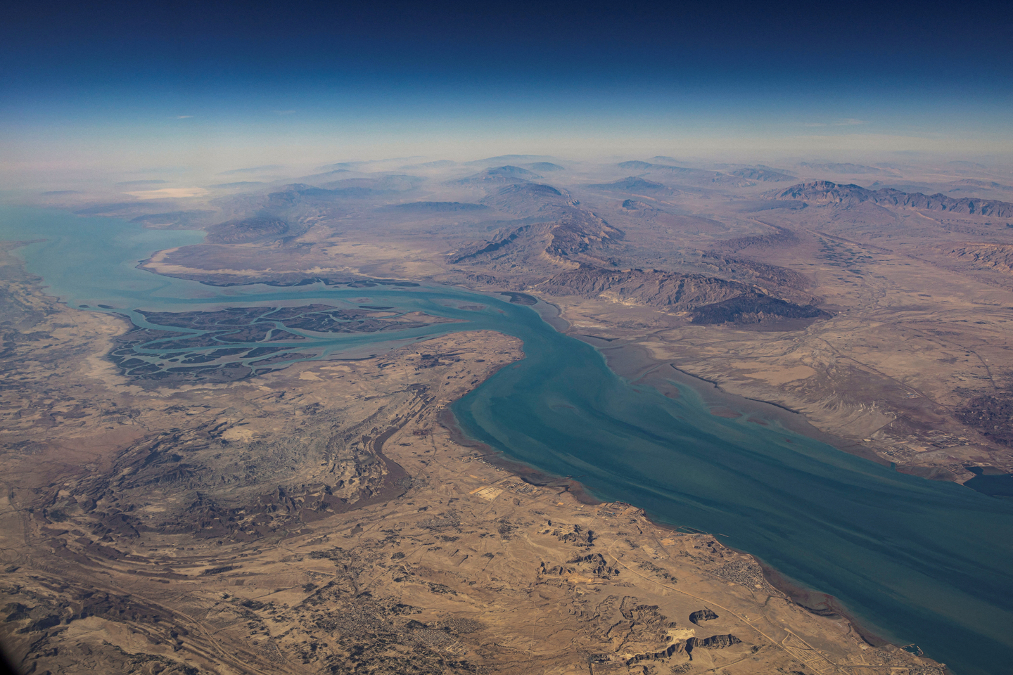 An aerial view of the Iranian shores and the island of Qeshm in the strait of Hormuz is pictured on Dec. 10, 2023. [REUTERS/YONHAP]
