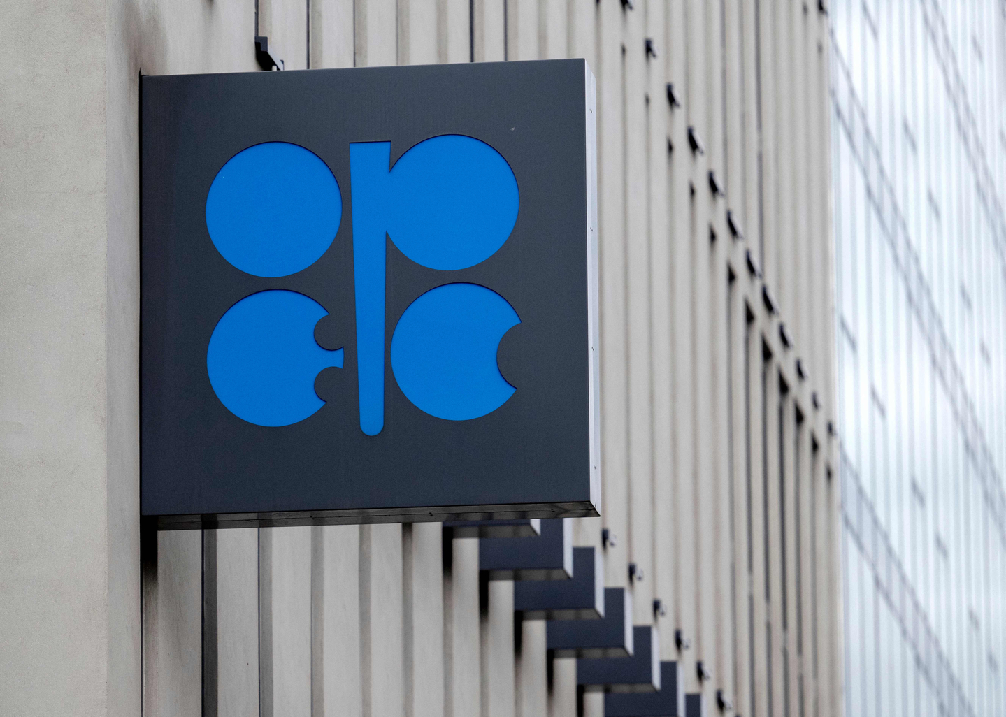 The sign with the logo of the Oil Producing Exporting Countries (OPEC) hangs outside its headquarters in Vienna on Oct. 4, 2022. Key members of the OPEC oil cartel announced a greater-than-expected increase to production quotas on March 1, following U.S. and Israeli strikes on Iran that triggered retaliation by Tehran across the Middle East. [AFP/YONHAP]