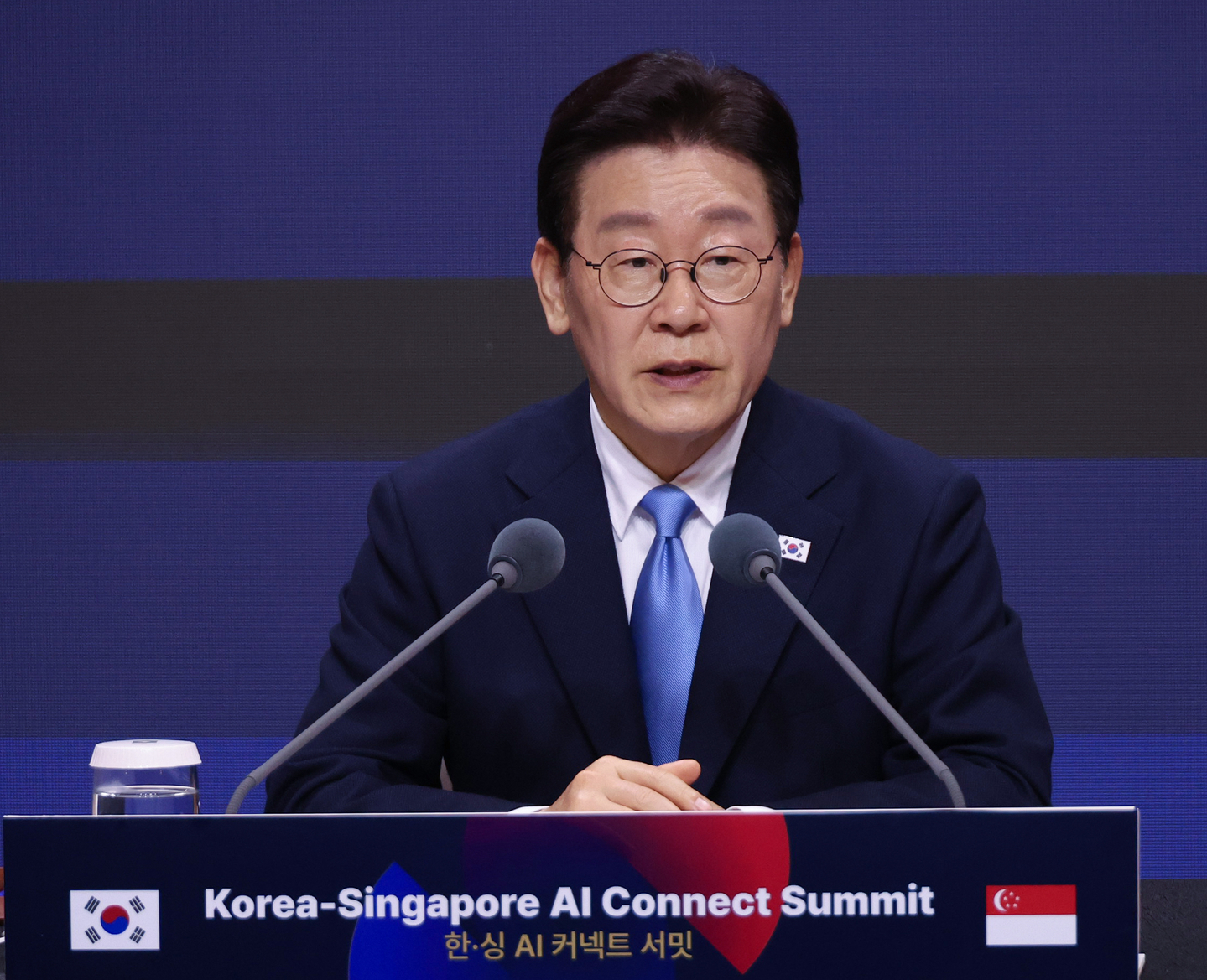 President Lee Jae Myung speaks during the AI Connect Summit at a hotel in Singapore on March 2. [NEWS1] 