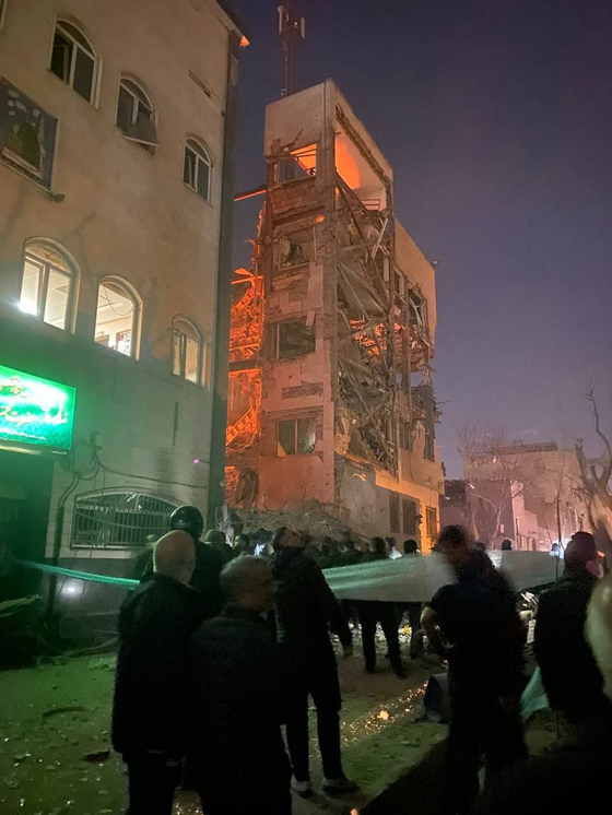 A building in Tehran, Iran is seen after a bombing on March 1. [SCREEN CAPTURE]