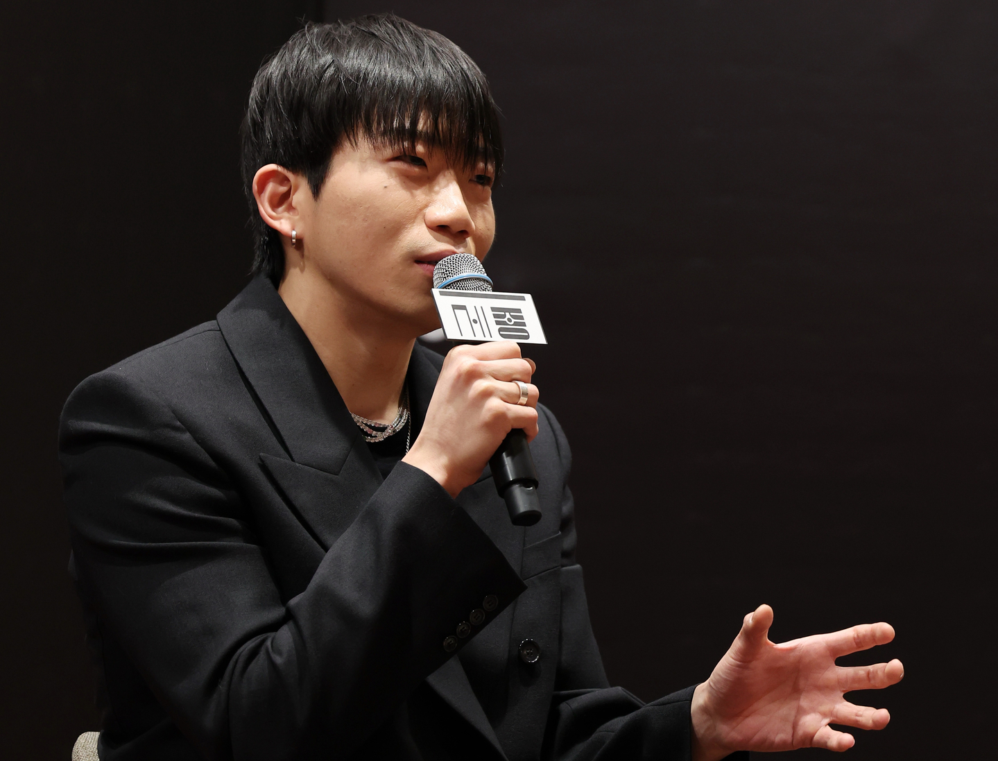 Rapper Changmo speaks during a press conference at Sejong Arts Academy Circle Hall in central Seoul on March 4. [YONHAP]