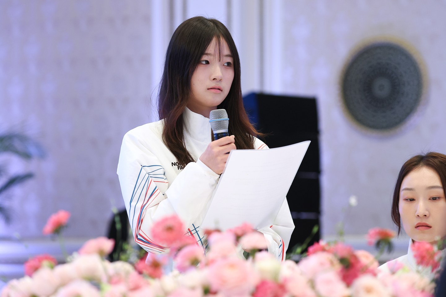 Olympic snowboard gold medalist Choi Ga-on speaks during a luncheon hosted by President Lee Jae Myung to congratulate the Korean national team, which competed in the 2026 Milan-Cortina Winter Olympics, at the state guesthouse of the Blue House in Jongno District, central Seoul, on March 5. [YONHAP]