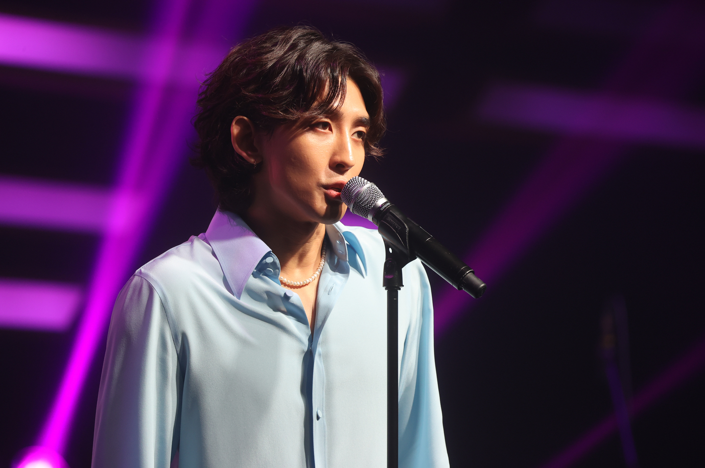 Band Jannabi front man Choi Jung-hoon sings during a press event in Mapo District in western Seoul on July 6, 2022. [YONHAP]  