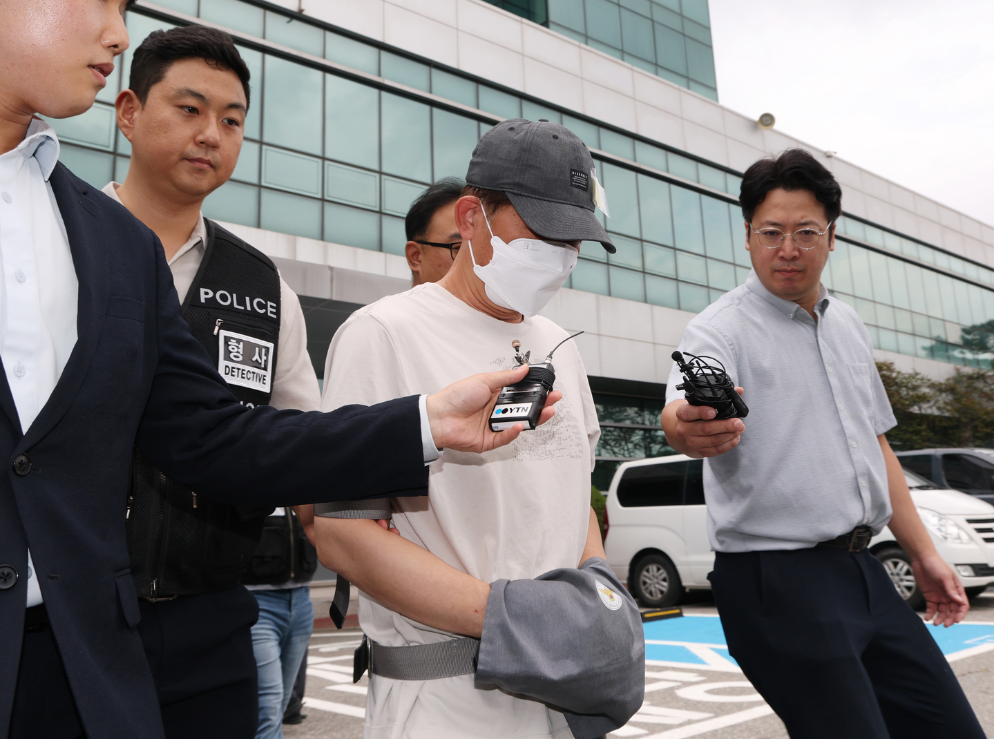 A man who faces charges of murder of a woman is seen in front of the Yongin Dongbu Police Precinct on Sept. 16, 2025. [NEWS1] 