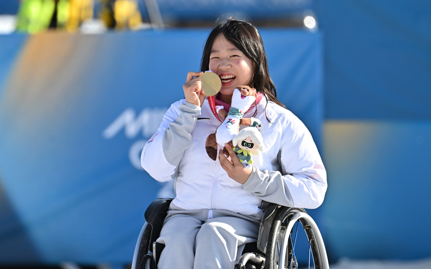 Kim Yun-ji of Korea celebrates after winning the gold medal in the women's para biathlon individual sitting event at the Winter Paralympics at Tesero Cross-Country Skiing Stadium in Tesero, northern Italy, on March 8. [JOINT RPESS CORPS]