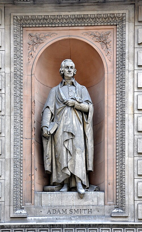 A statue of Adam Smith built between1867-1870 is seen at the old headquarters of the University of London. [WIKIPEDIA]