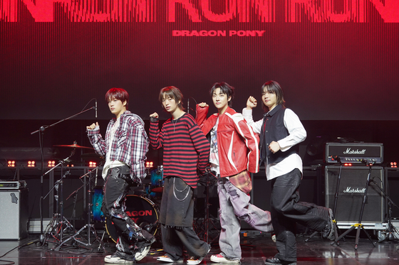 Rock band Dragon Pony poses for photos during a press showcase for its third EP, ″Run Run Run,″ held at the Yes24 Wanderloch Hall in western Seoul on March 10. [ANTENNA]