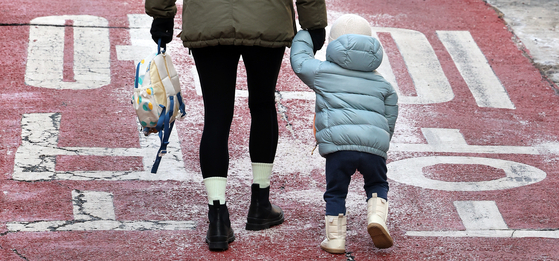 A child heads to a daycare center in Seoul on Feb. 11, 2025. [NEWS1] 