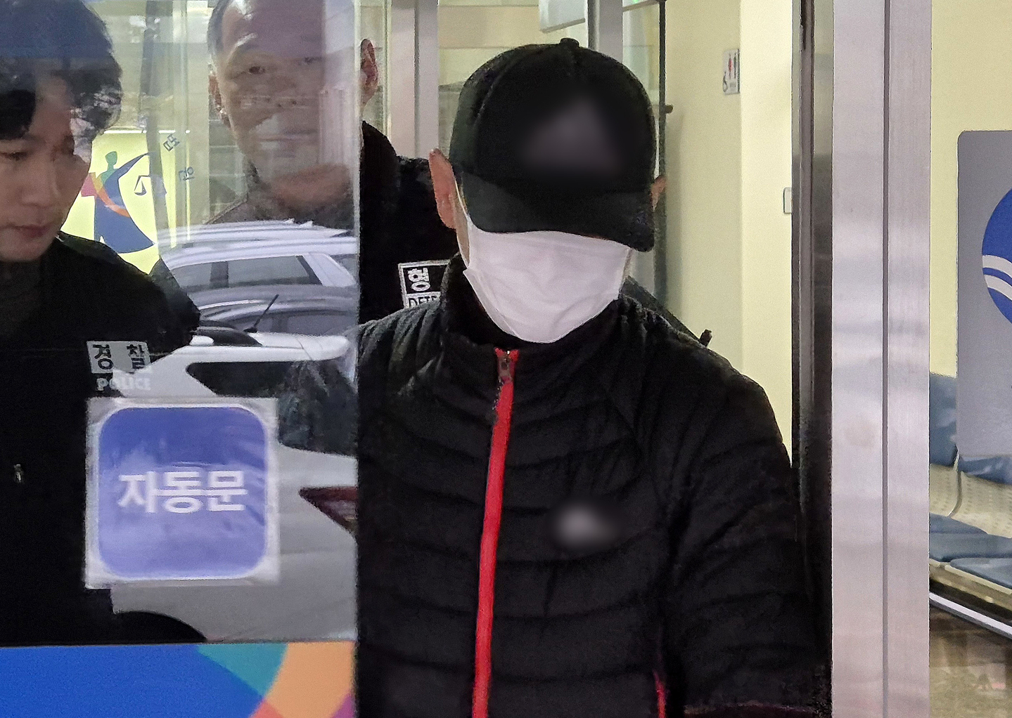 A man who is accused of throwing boiling water on the face of his Thai spouse and causing severe burn injuries is seen at Uijeongbu District Court in Uijeongbu, Gyeonggi, on Dec. 16, 2025. [NEWS1]