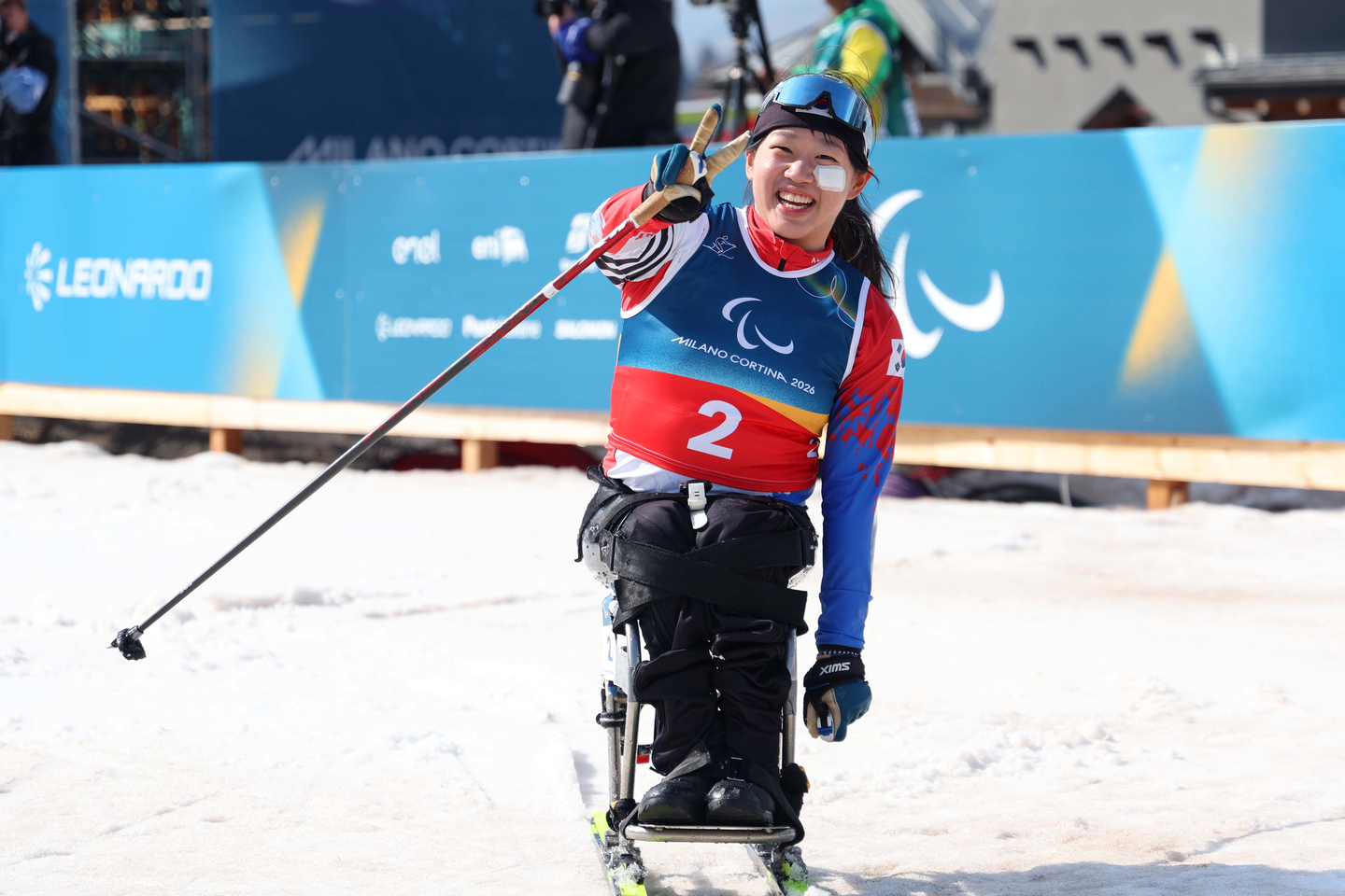 Kim Yun-ji celebrates after winning silver with a time of 33:10.1 in the para cross-country skiing women's sprint sitting medal final at the 2026 Milan-Cortina Winter Paralympics at the Tesero Cross-Country Skiing Stadium in Italy on March 10. [KOREA PARALYMPIC COMMITTEE]