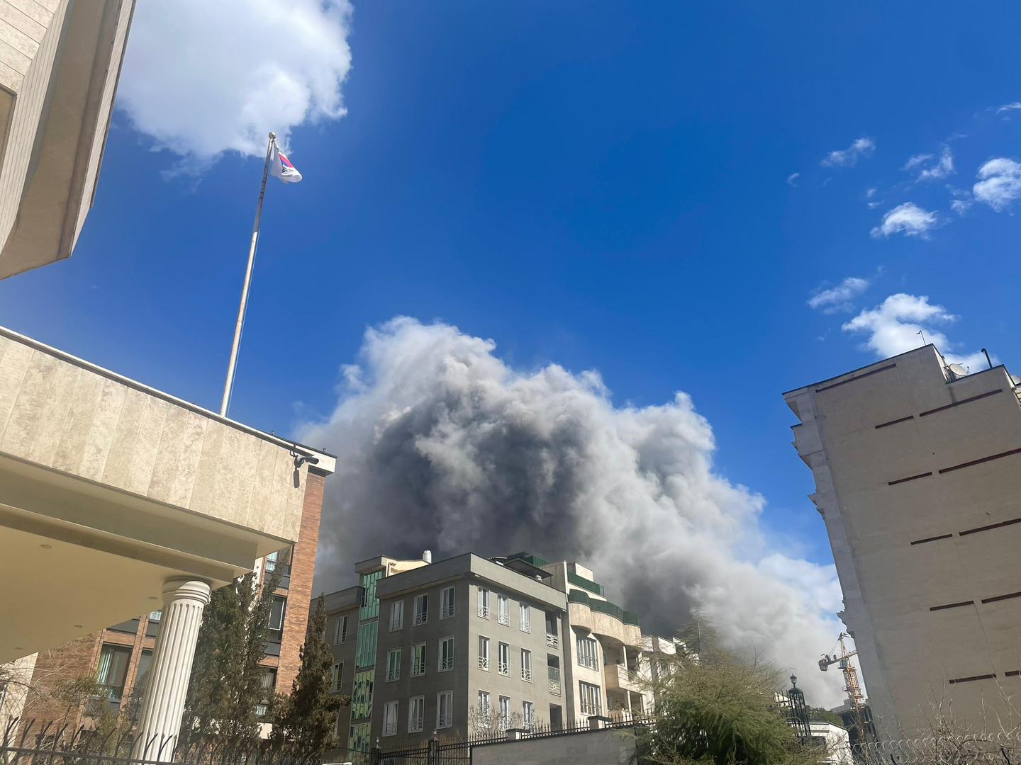 A massive plume of smoke rises near the Korean Embassy in Iran following bombardment in the surrounding area. [MINISTRY OF FOREIGN AFFAIRS]