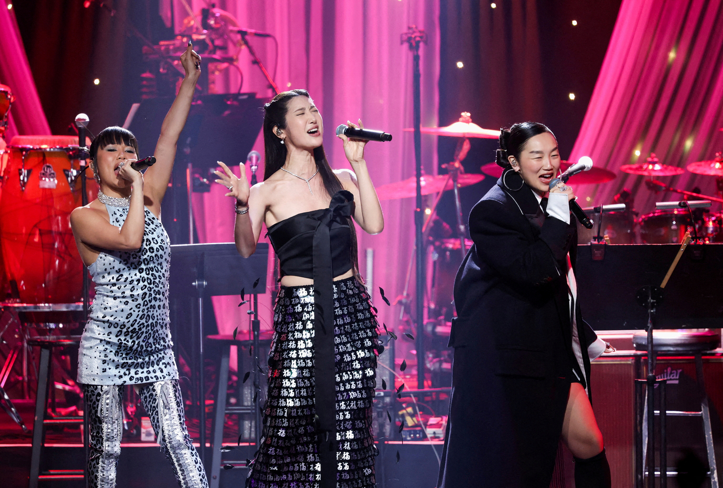 Singers Audrey Nuna, EJAE and ReiAmi perform during the annual Pre-Grammy Gala, in Beverly Hills, California, on Jan. 31. [REUTERS]