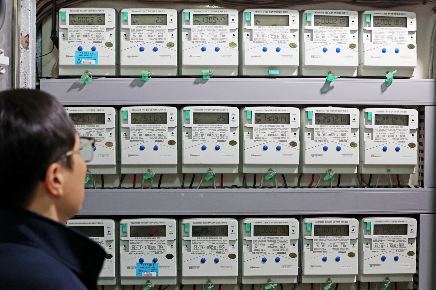 This file photo, taken Dec. 18, 2025, shows electricity meters at a building in Seoul. [YONHAP] 