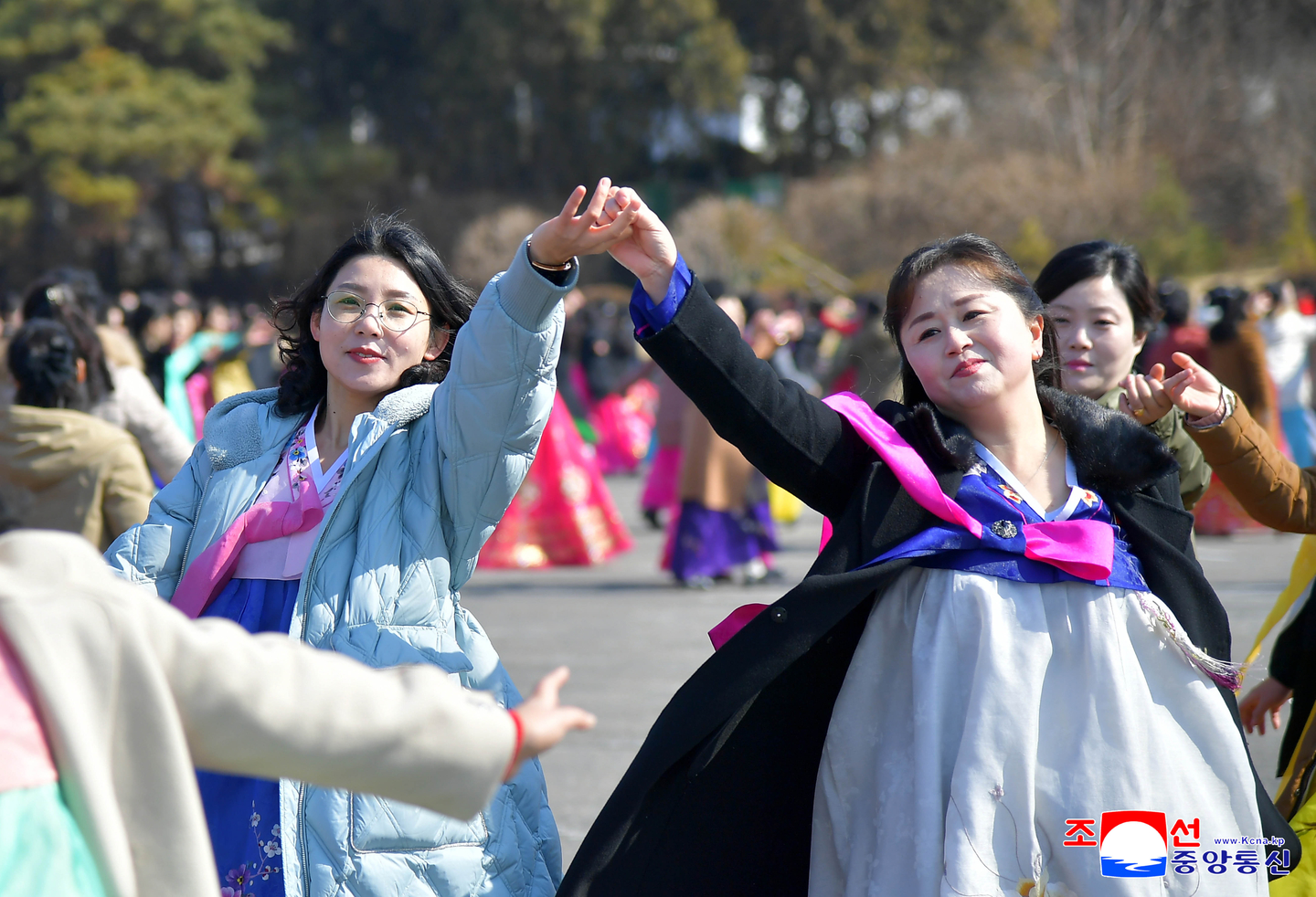 Members of the Socialist Women's Union, North Korea's largest women's organization, dance in a ball in Pyongyang on March 8, marking International Women's Day, in this photo published by the Korean Central News Agency the following day. [YONHAP] 