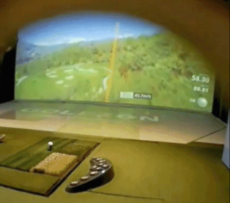 A remote control allegedly used to change the direction of the screen while the victim briefly turned their head to swing during a screen golf game played for money, in this surveillance footage still provided by police [SEOUL METROPOLITAN POLICE AGENCY]