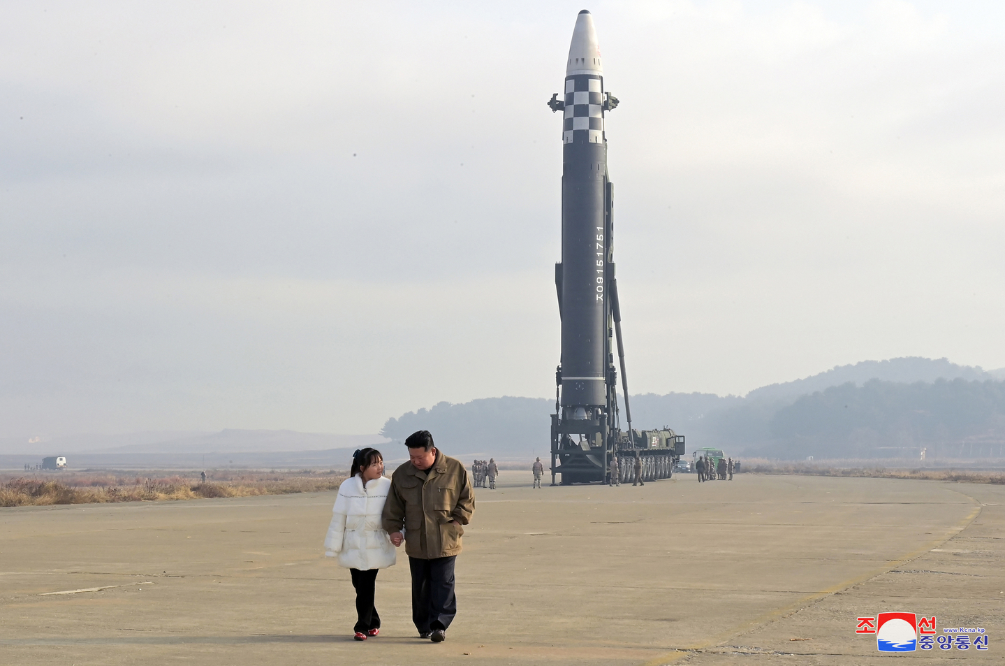 North Korean leader Kim Jong-un, right, and his daughter attend a test launch of the Hwasong-17 intercontinental ballistic missile on Nov. 18, 2022, in this photo released by Pyongyang's state-controlled Korean Central News Agency the following day. The test marked Kim's first appearance in North Korean state media. [YONHAP]
