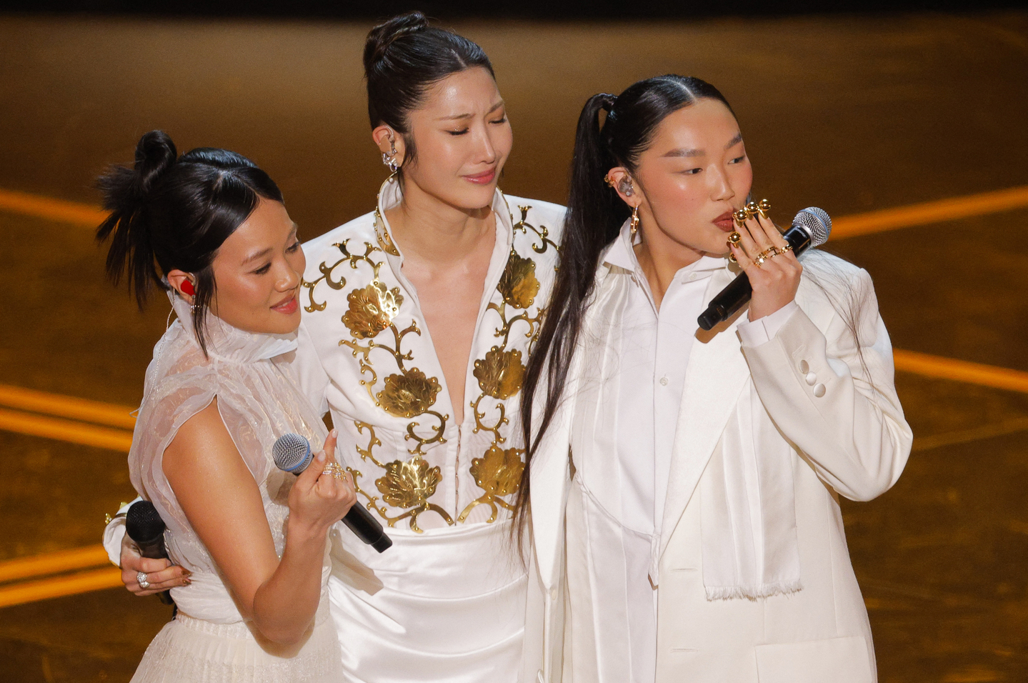 Rei Ami, left, EJAE, center and Audrey Nuna from "KPop Demon Hunters" (2025) perform on stage during the Oscars show at the 98th Academy Awards in Hollywood, California, on March 15. [REUTERS/YONHAP]