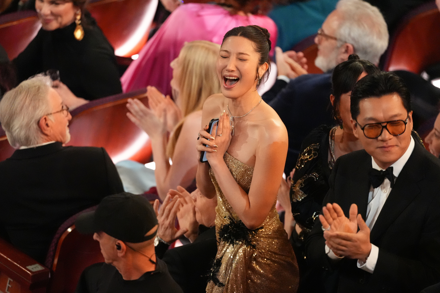 EJAE cheers in the audience after ″KPop Demon Hunters″ (2025) wins the award for best animated feature film during the Oscars on March 15 at the Dolby Theatre in Los Angeles. [AP/YONHAP]