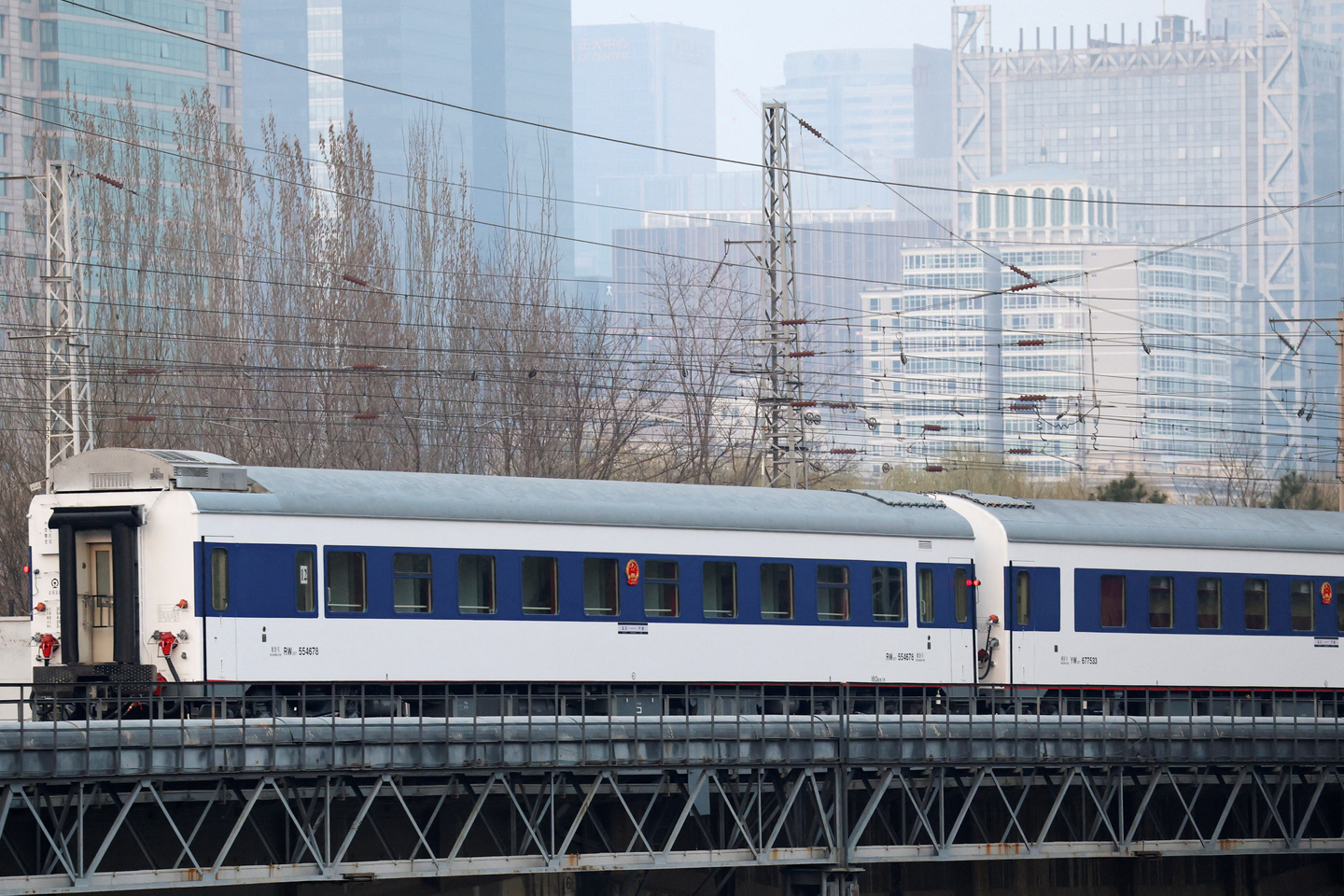 A passenger train with cross-border service to North Korea's Pyongyang leaves Beijing Railway Station in Beijing on March 12. [REUTERS/YONHAP]
